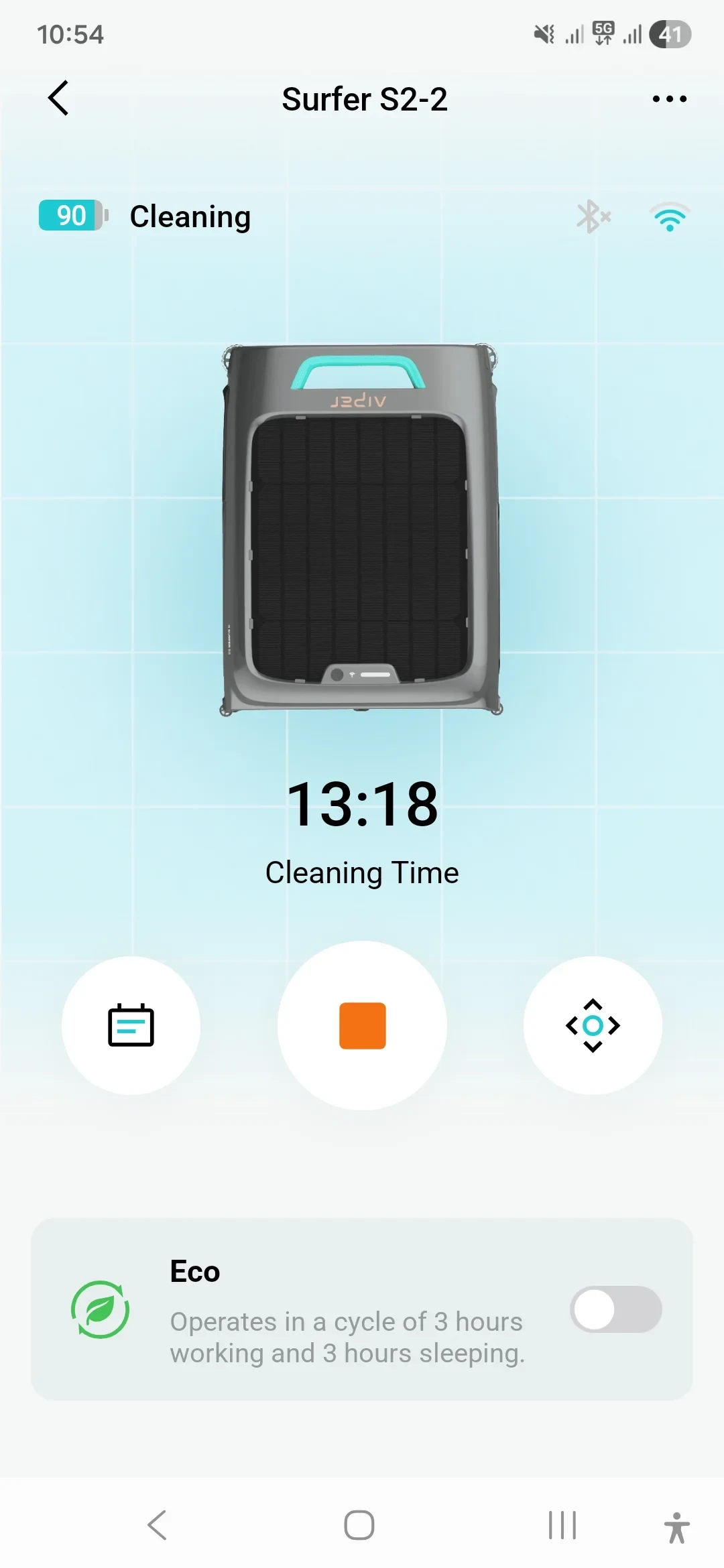 A smartphone app screen displaying the status and controls for a robotic pool cleaner named 'Surfer S2-2'. The interface shows a 90% battery indicator, 'Cleaning' status, an overhead view of the device on a light blue pool grid, a cleaning time of 13:18, control buttons including a stop button in the center, and an Eco mode toggle switch at the bottom.