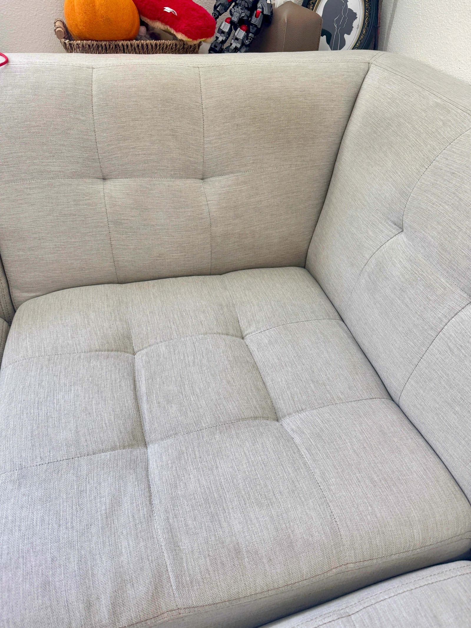 A wider view of the sofa presented by the owner after cleaning.