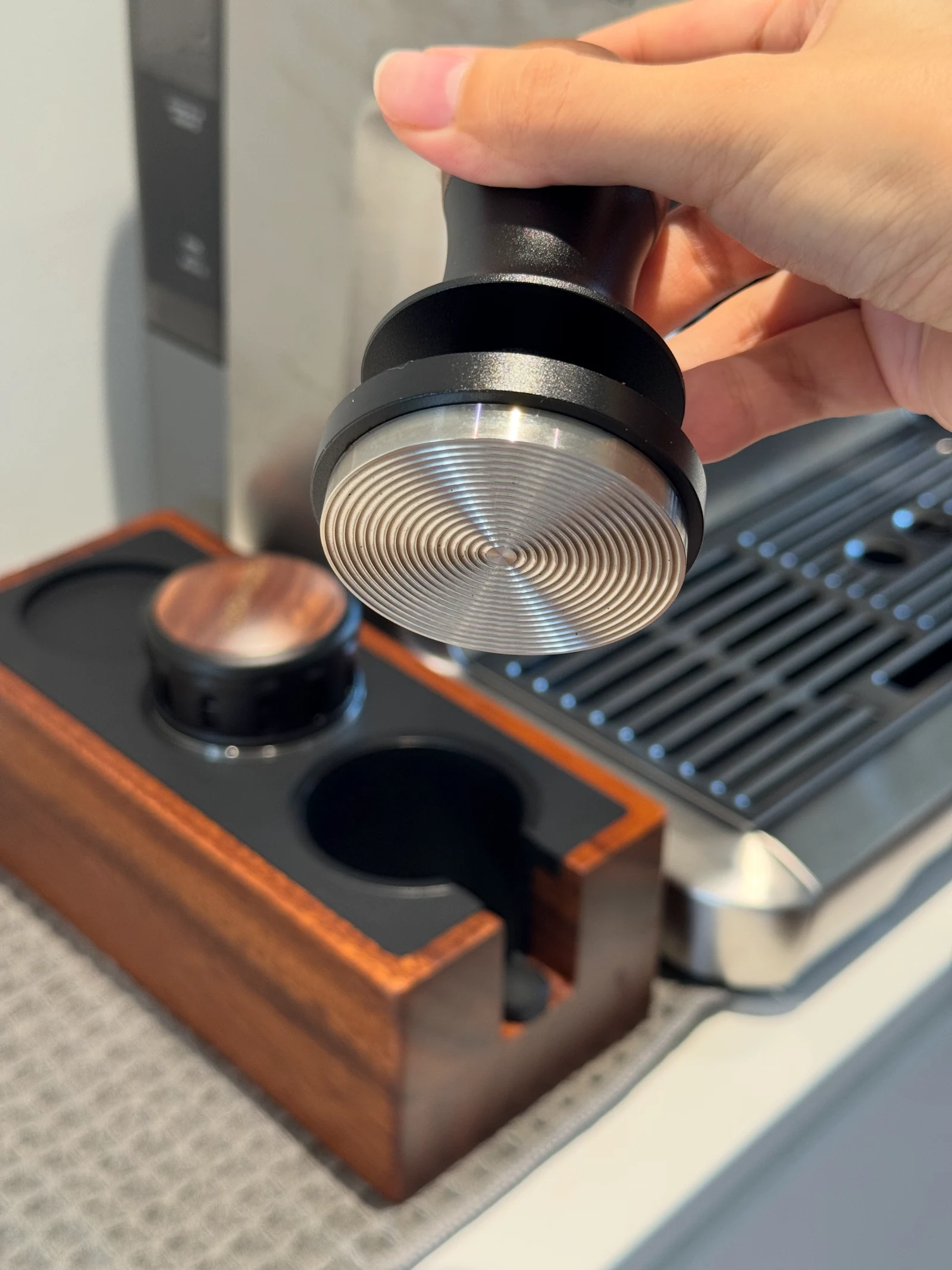 The concentric pattern on the tamper’s base.