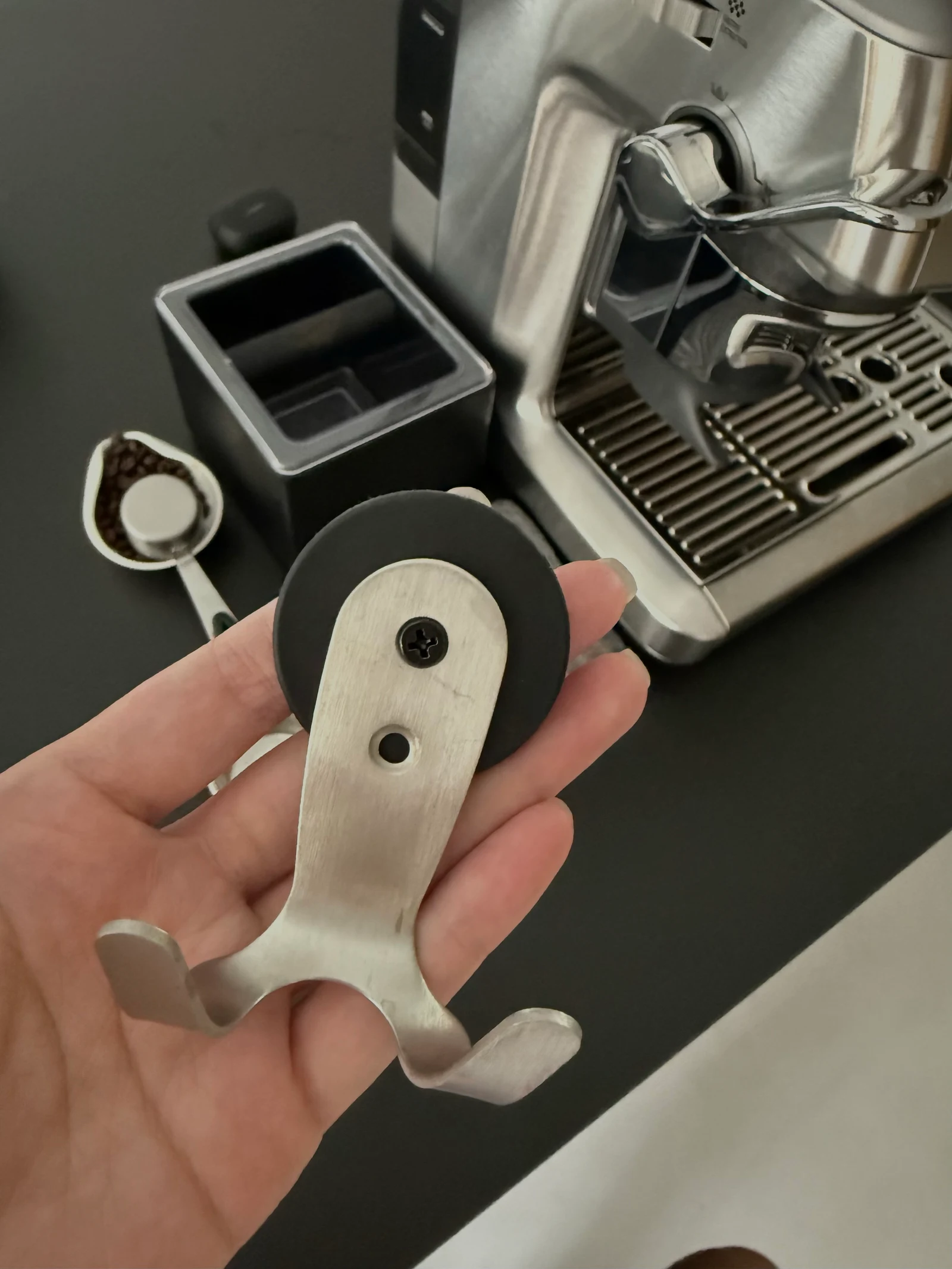 The magnetic hook removed from the machine.