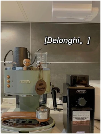 A mint-green retro DeLonghi Icona espresso machine with a portafilter sits on a kitchen counter beside a black coffee appliance.