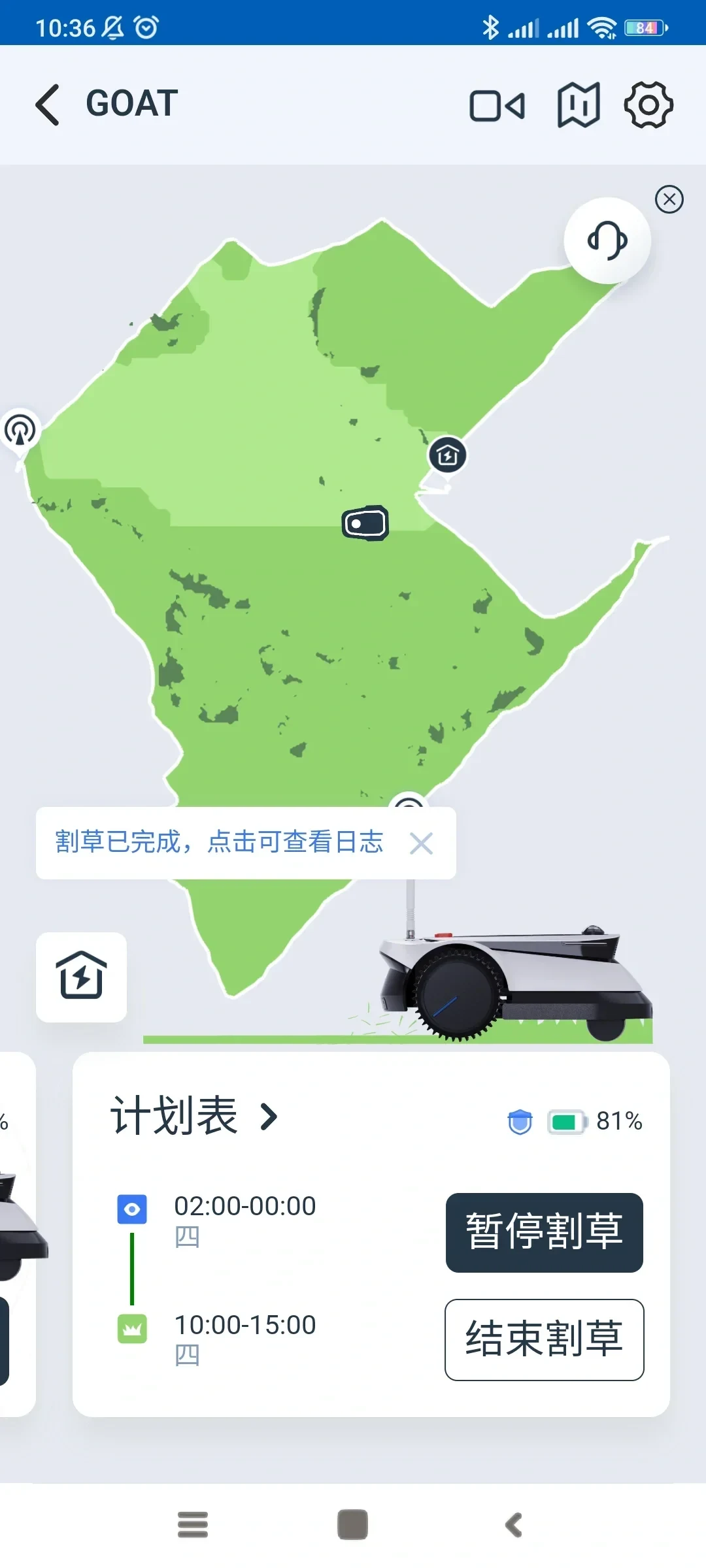 Smartphone screen displaying the control interface of the GOAT robotic lawn mower app. A green map outlines the mapped lawn with beacons and dock icons. A notification banner states that mowing is complete. Below the map, an image of the mower is shown alongside a schedule section displaying set time intervals and action buttons to pause or end mowing.