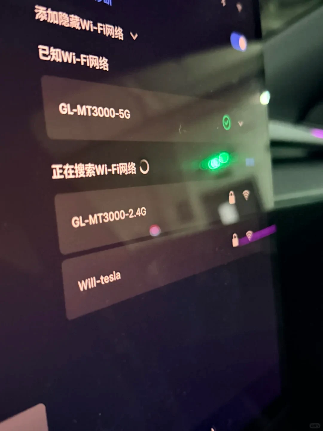 A close-up of a Wi-Fi settings screen shows a list of networks, including GL-MT3000-5G, GL-MT3000-2.4G, and Will-tesla, with a search-in-progress indicator.