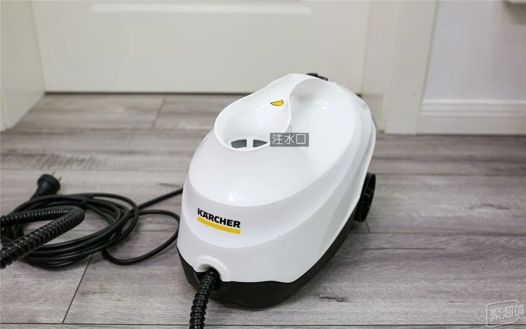 White Kärcher SC3 steam cleaner base unit resting on a light wood-look floor, with a labeled water inlet on top.