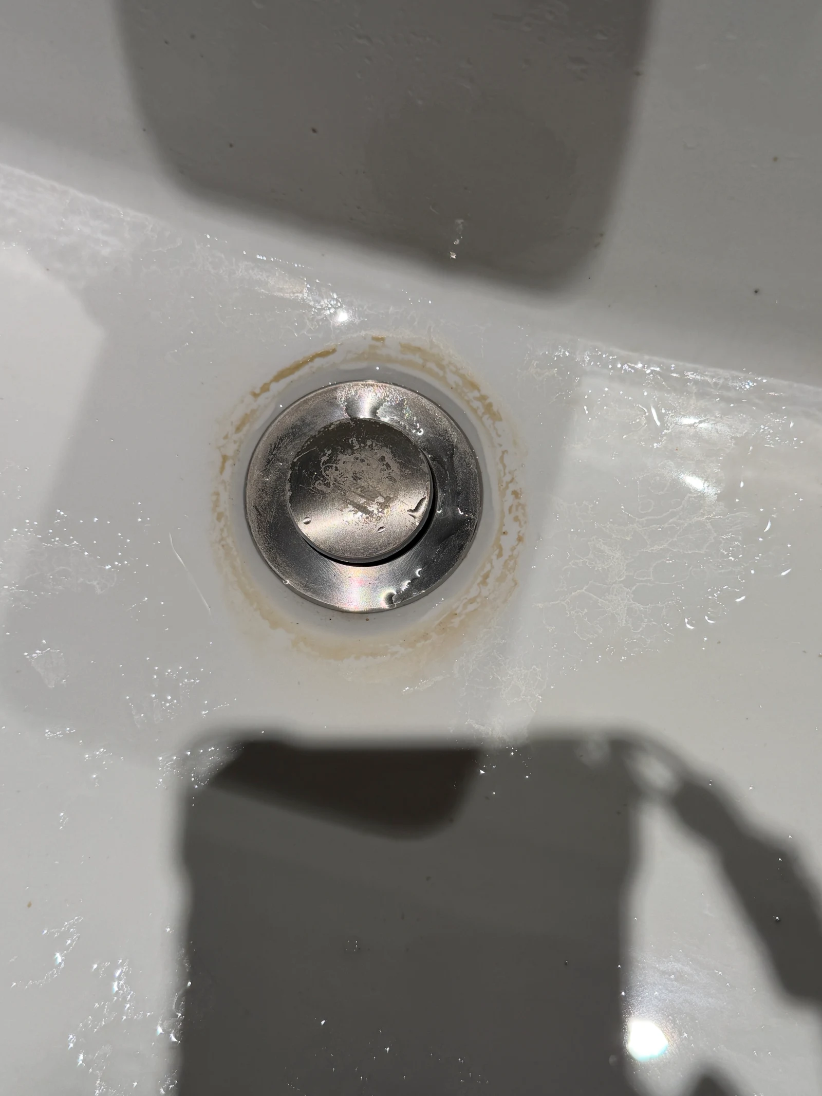 Scale remaining around the drain in the owner’s final photograph.