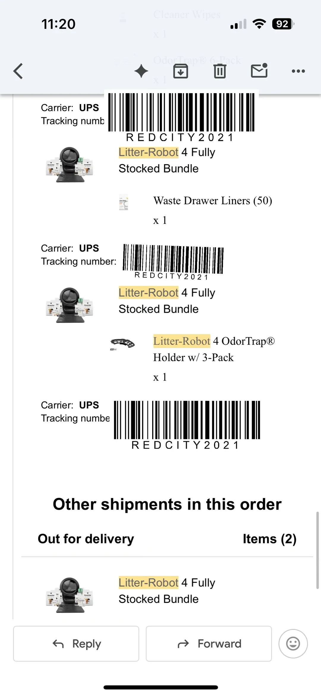 A mobile screenshot of an order shipment email listing items from the Litter-Robot 4 Fully Stocked Bundle, including waste drawer liners and an OdorTrap holder.
