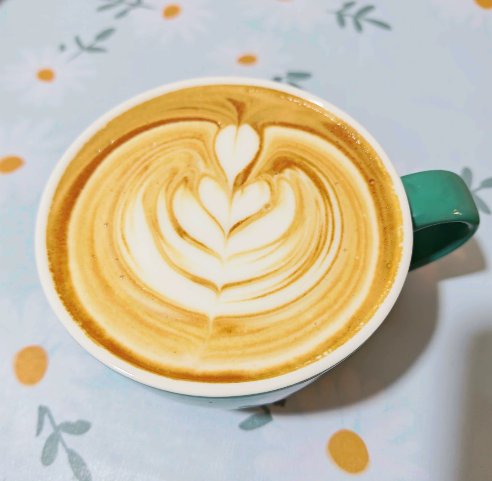 A cup of latte art from the owner’s coffee routine.
