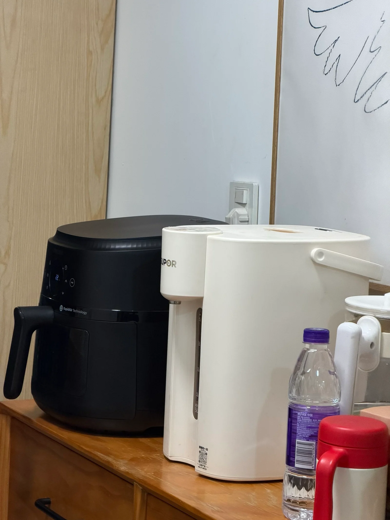 The NA230 standing beside other appliances in the owner’s kitchen.