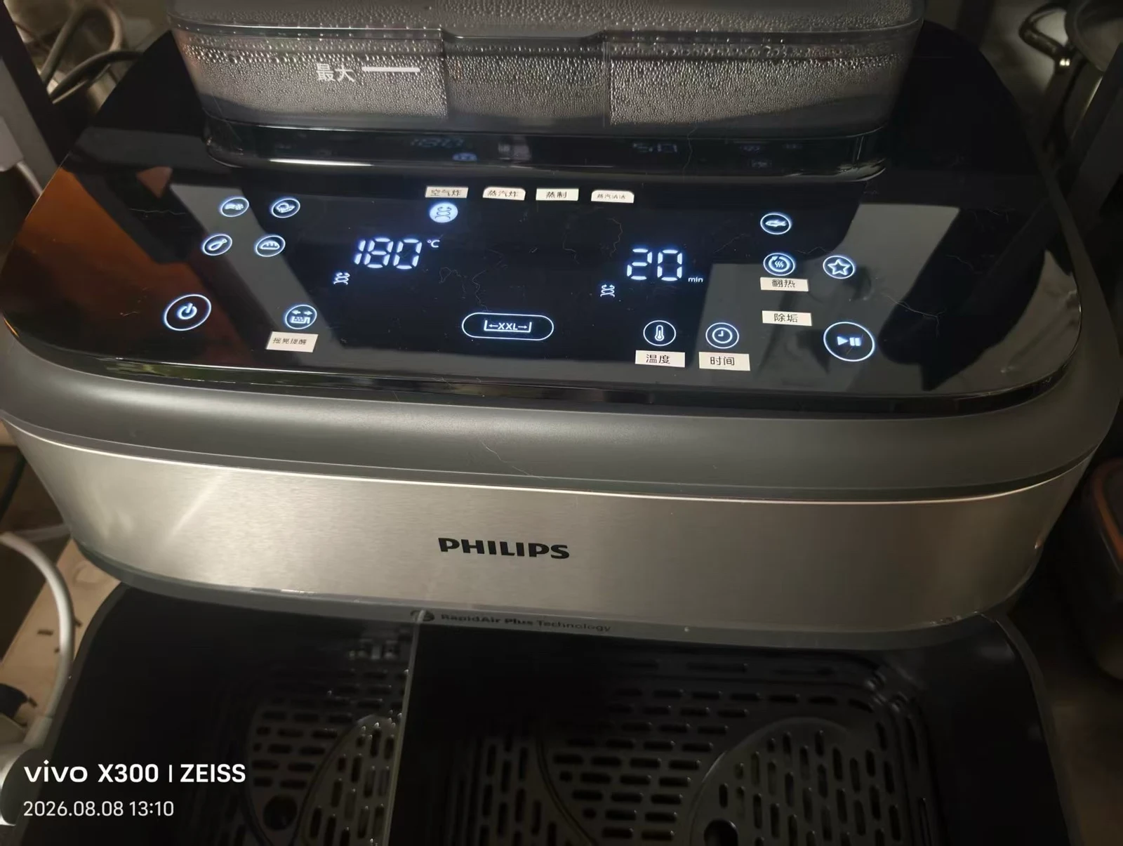 The labelled controls above the open drawer.