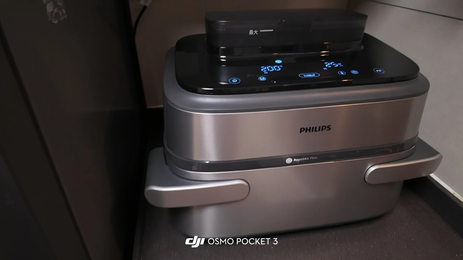A Philips NA565 with its water tank and wide drawer on a kitchen counter.