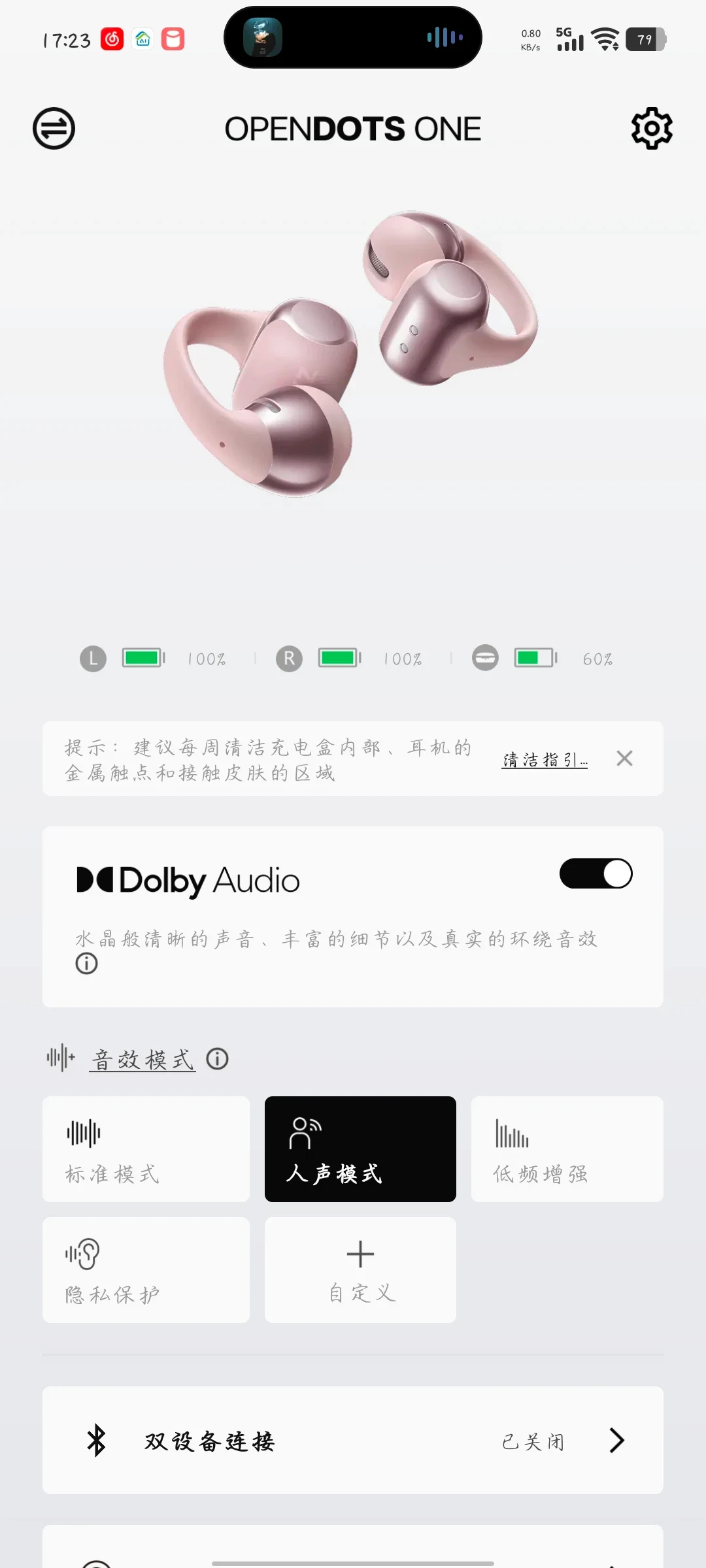 Screenshot of a companion smartphone app for OPENDOTS ONE clip-on earbuds showing pink earbuds, battery status, a Dolby Audio toggle, and sound effect mode presets.