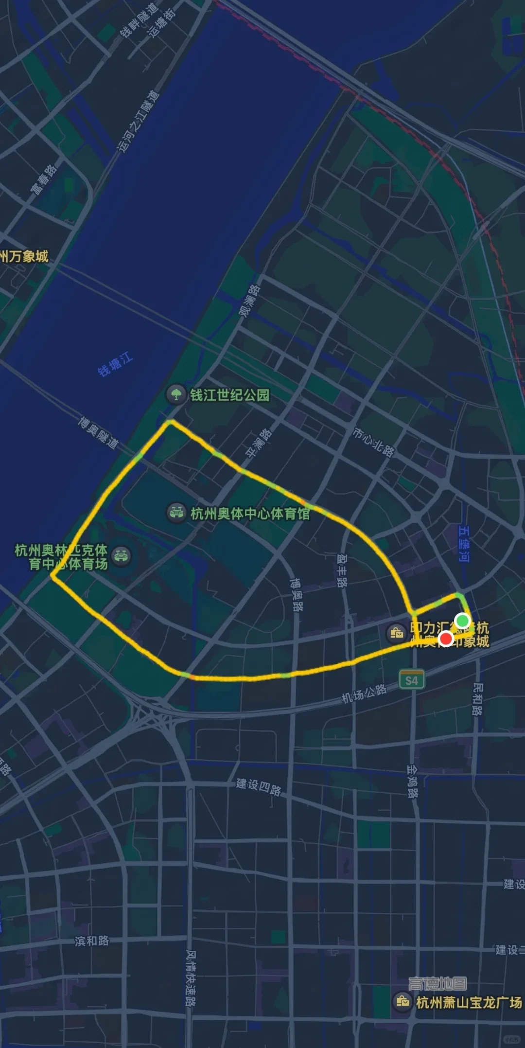 A dark-mode digital map of Hangzhou showing an area along the Qiantang River, with a yellow loop outlining a route around the Hangzhou Olympic Sports Center and connecting to the Incity shopping mall.