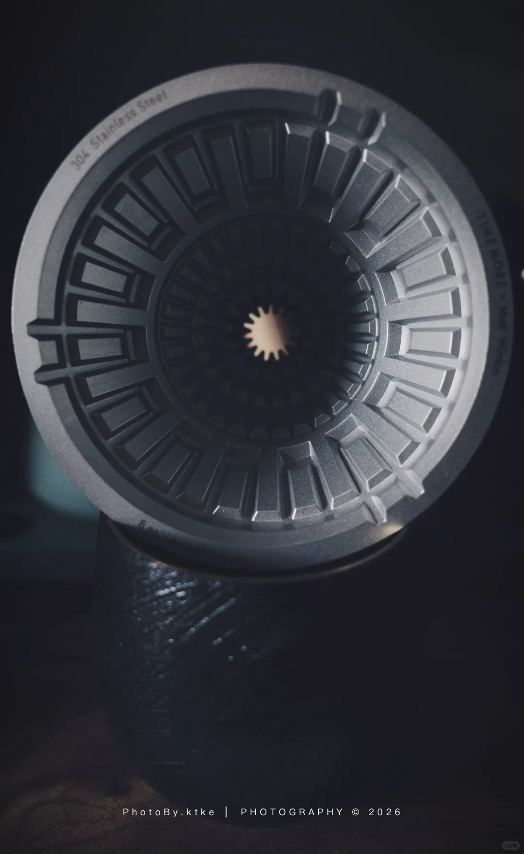 A top view of the VECTOR dripper shows the ribbed brewing cone and engraved 304 stainless steel and TIMEMORE x Matt Winton markings. It sits over a dark textured cup.