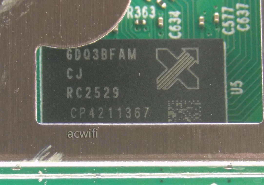 Close-up view of a CXMT memory chip labeled GDQ3BFAM CJ RC2529 on the green circuit board.