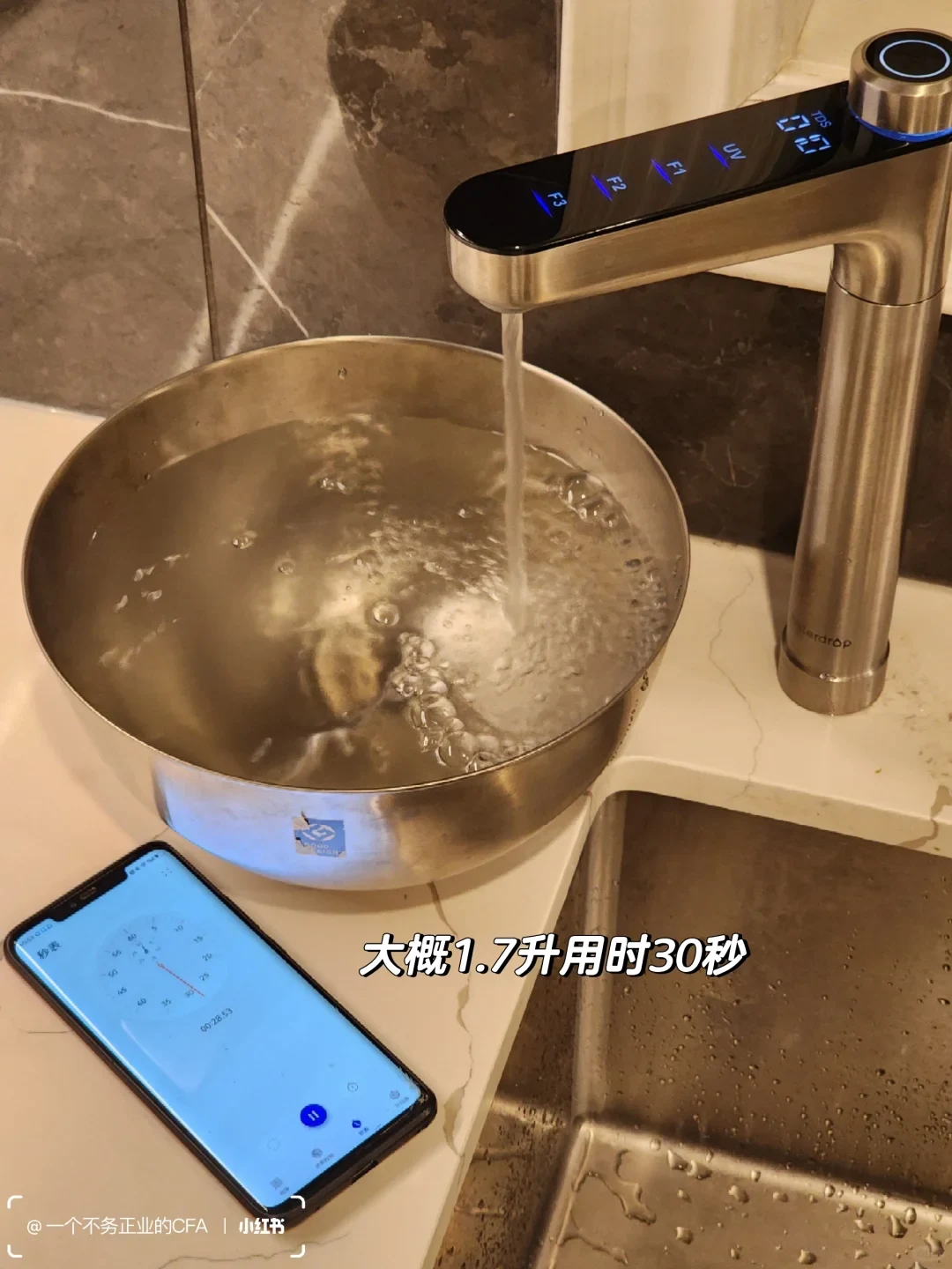 A digital faucet runs water into a large metal pot on a kitchen counter, with a smartphone beside it. The overlaid caption says it takes about 30 seconds to dispense 1.7 liters.